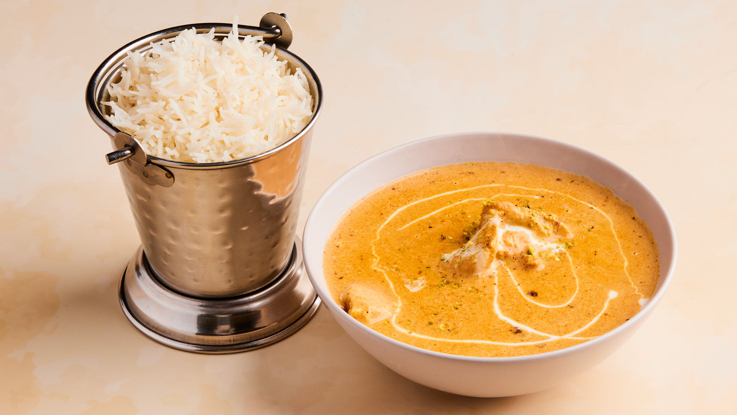 64. Lucknavi murgh korma.